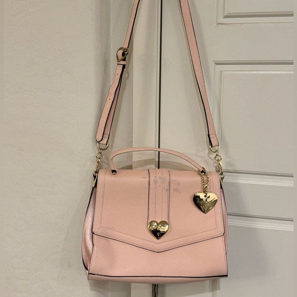 Betsey Johnson Handbags - Betsey Johnson Pink Handbag with Gold accent hearts, (low price due to stains)